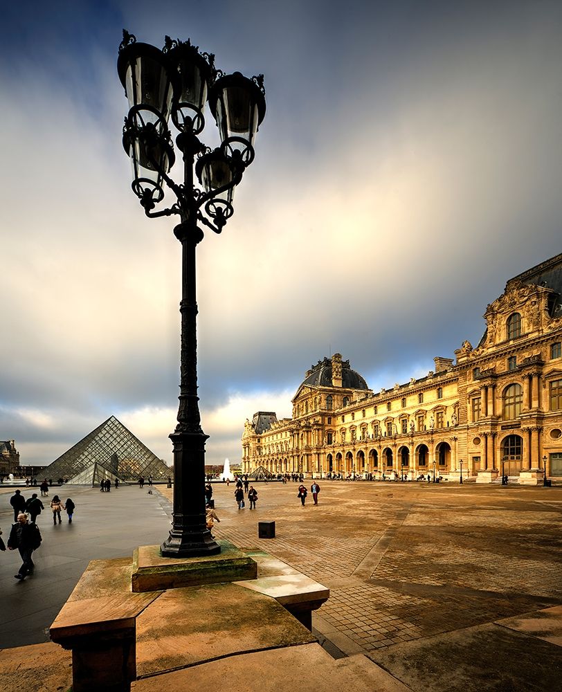 Pyramid and courtyard to the Louvre in Paris-France
